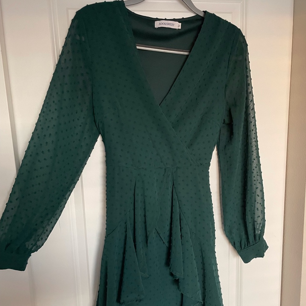 Emerald green light and flowy dress.